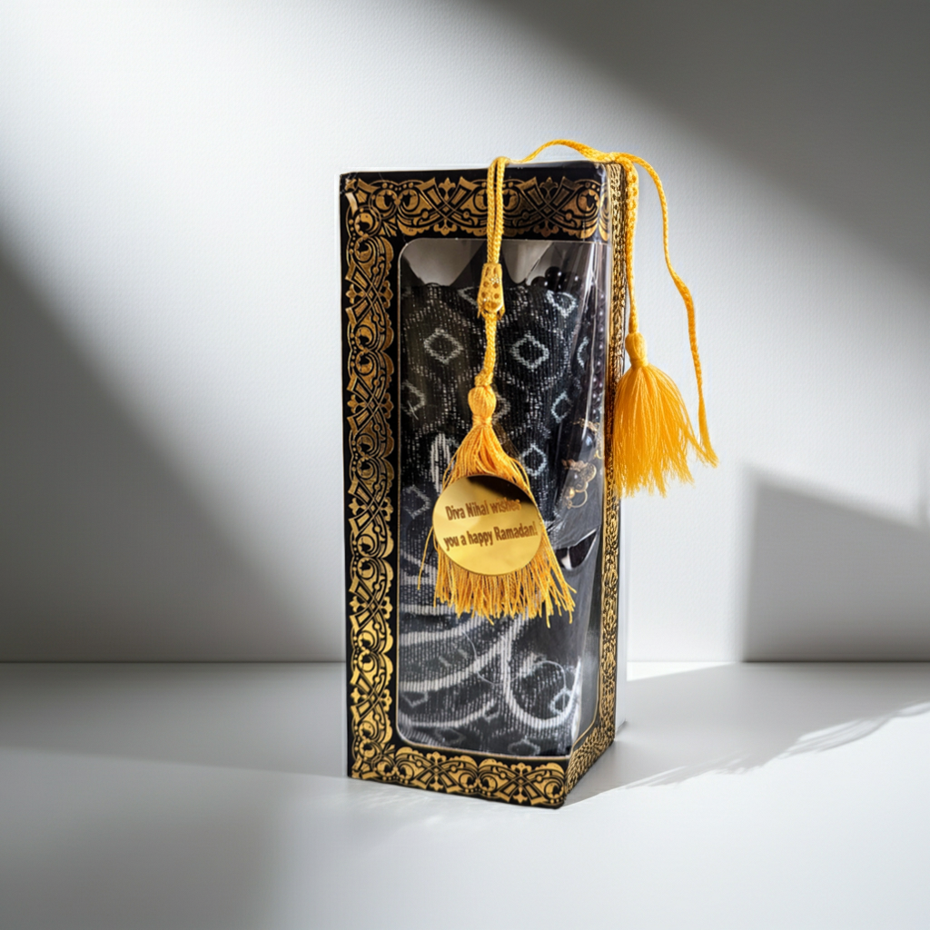 Decorative gift box with tassels on a white background