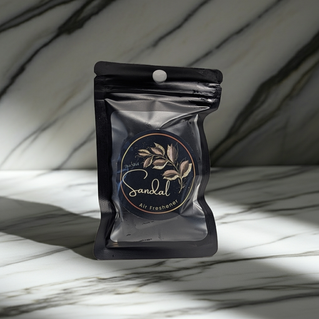 Black air freshener packaging with &
