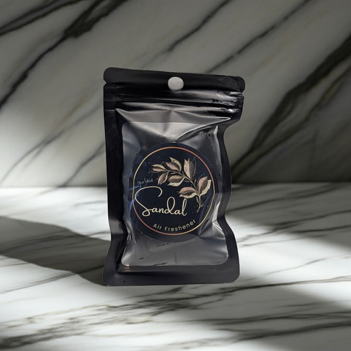Black air freshener packaging with &