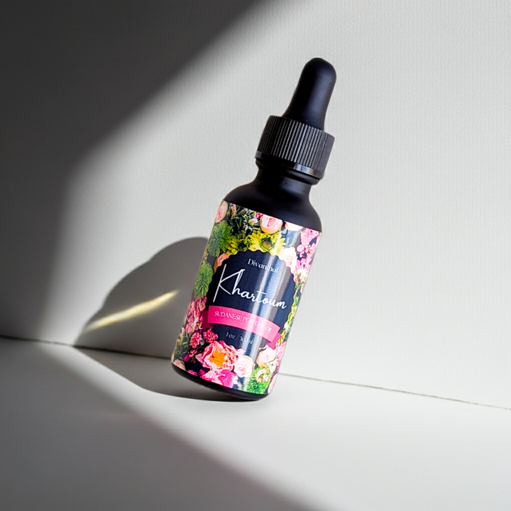 Bottle with floral label on a light background